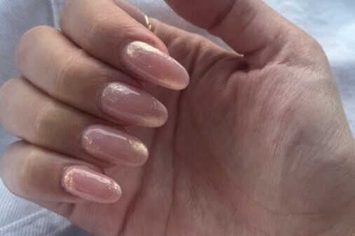 A pink oval shape nail