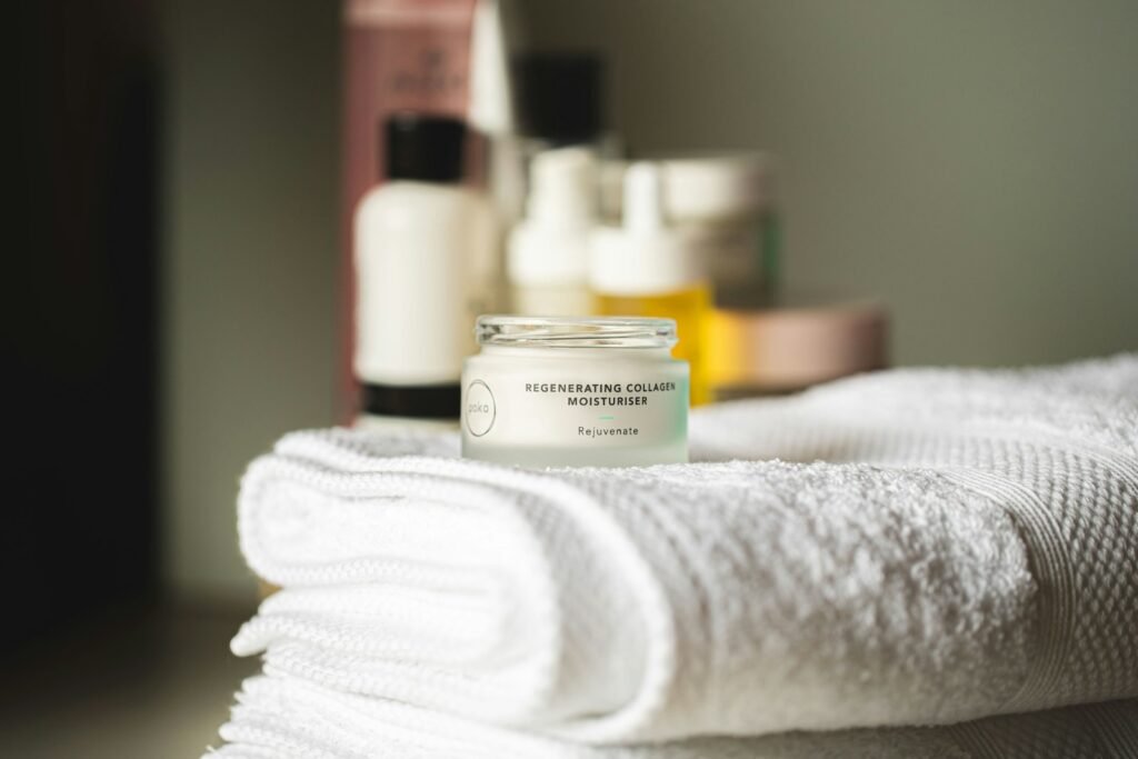 a moisturizer bottle on white textile for a radiant skin.