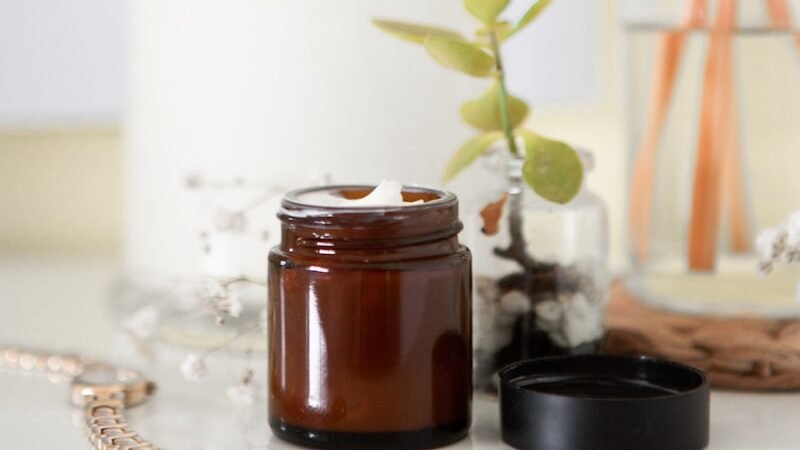 A luxurious moisturizer bottle from a premium beauty products collection.